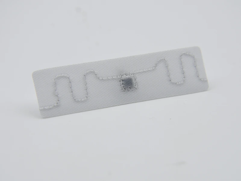 58*15mm U9XE UHF Laundry Tag 