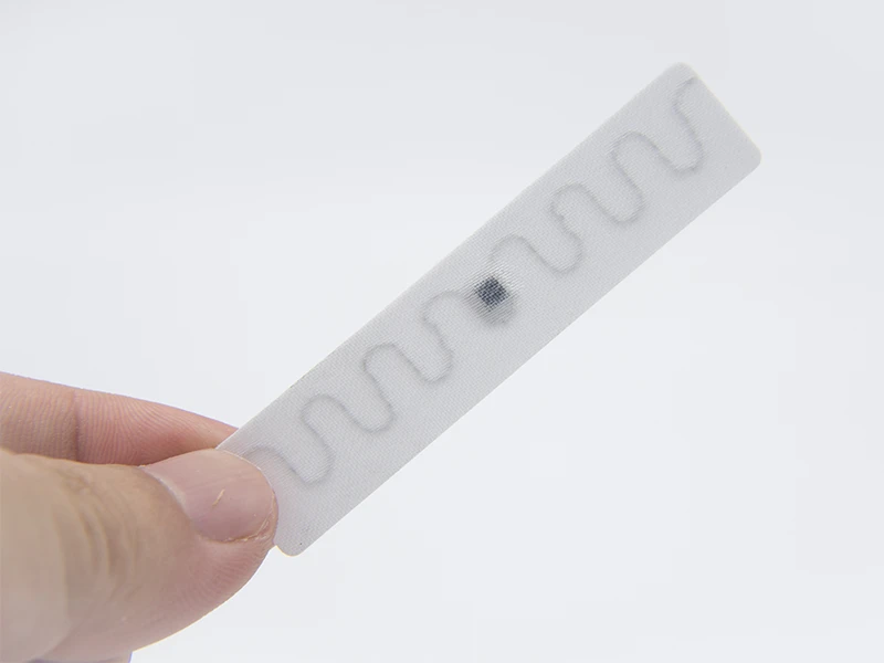 70*15mm U9XE UHF Laundry Tag 