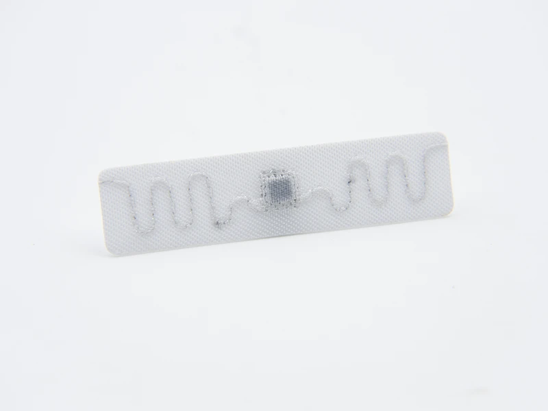50*12mm U9XE UHF Laundry Tag 