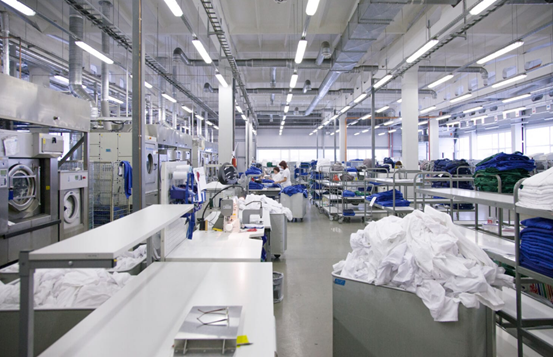 Smart Double-Frequency Laundry Tags Applied in Laundry Factories
